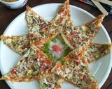 A picture of step 23 of Paneer Pizza Dosa.