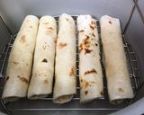 A picture of step 2 of Bake chicken taquitos.