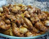 Foto del paso 7 de la receta Alitas de pollo al horno con guarnición