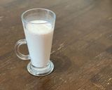 A picture of step 4 of Strawberry banana smoothie using a hand blender.