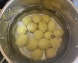 A picture of step 3 of Crushed new potatoes.