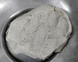 A picture of step 2 of Jowar roti malida.