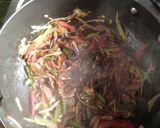 A picture of step 2 of Veg sizzler of sehezwan hakka noodles with sauteed vegetable.