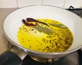 A picture of step 2 of Raw mango curry.