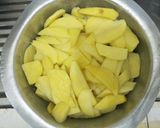 A picture of step 1 of French fries with chicken.