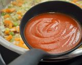 Foto del paso 3 de la receta: Arroz con pota y salmón