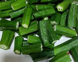 A picture of step 6 of Bhindi chicken.