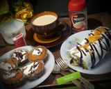 A picture of step 14 of CHOCOLATE CHIP ORANGE SWISS ROLL, CUP CAKES AND MILK COFFEE.