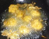 A picture of step 12 of Yam balls and egg into egg.