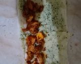 A picture of step 16 of Tandoori chicken rolls up.