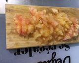 Une image de l'étape 2 de Tomates géantes farcies sur lit de porc aux légumes.