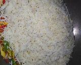 A picture of step 10 of French beans chicken and veg fried rice.