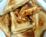 A picture of step 3 of Chicken tikka cheese sandwiches 😊.