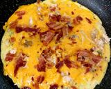 A picture of step 7 of My left Over Chicken,Bacon & Cheese Omelette 🤩.