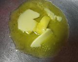 A picture of step 2 of Mashmellow jelly rice crisps chocolate rolls.