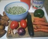 A picture of step 1 of Spicy Potato Curry with Carrots and Peas.