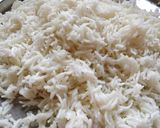 A picture of step 1 of Coconut rice.