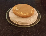 A picture of step 14 of Hazelnut Layer Cake with Hazelnut Cream Frosting.