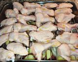 Foto del paso 5 de la receta Alitas al horno con patatas y cebolla