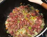 Foto del passaggio 2 della ricetta Risotto porri e salsiccia