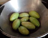 A picture of step 2 of Parwal methai.