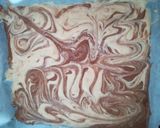 A picture of step 10 of Marbled Swiss Roll Filled with Cream and Strawberries with Chocolate.