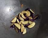 A picture of step 3 of Vangi Bath (Brinjal fried rice).
