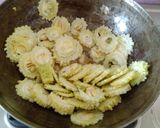 A picture of step 2 of Karlyachi bhaji(bitter gourd curry).
