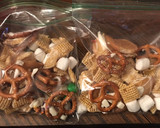 A picture of step 4 of Buddy the elf Chex mix.