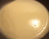 A picture of step 4 of Basic Crepe with strawberry banana Nutella spread.