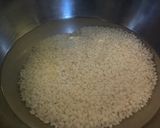 A picture of step 3 of Rice with Aged duck legs and Chinese sausages.