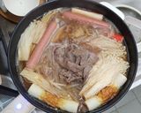 A picture of step 7 of Easy Sukiyaki with Napa Cabbage and Rice Noodles/Udon.