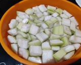 A picture of step 1 of Lauki matar curry.