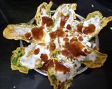 A picture of step 3 of Pan fried palak pakoda chaat.