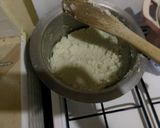 A picture of step 1 of Ugali, Eggs and Greens.