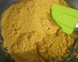 A picture of step 5 of Besan laddoo with sunflower and flax seeds.