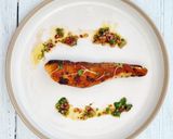 A picture of step 9 of Grilled salmon served with homemade chimichurri sauce.