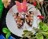 A picture of step 9 of Oreo butterfly cheese cake.