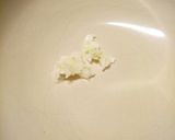 A picture of step 1 of New potatoes with a garlic and herb butter.