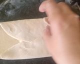 A picture of step 7 of Cheese stuffed paratha with smile emoji.