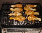 A picture of step 7 of Chicken paprika drums Skewered red hot Shrimps and grilled sausages.