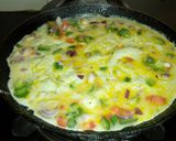 A picture of step 4 of Japeness egg rolls.