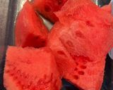 A picture of step 7 of Pla Hang Tang Mo. Watermelon with sweet and salty salmon flakes.