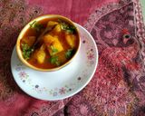 A picture of step 3 of Kashmiri style apple and tomato curry.