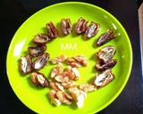 A picture of step 2 of Walnuts in Dates Dipped In Chocolate.