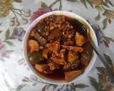 A picture of step 8 of Mango pickle with garlic and chana dal.