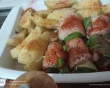 Foto del paso 7 de la receta: Roll de Merluza, vegetales y papas al horno