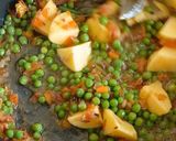 A picture of step 2 of Aloo, matar, polaw.