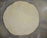 A picture of step 12 of Aloo walay nan.