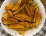 Foto del paso 2 de la receta: Patatas gajo especiadas al horno